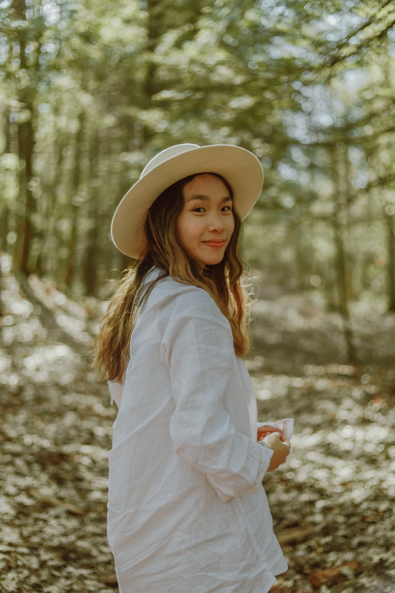 Woman Standing in the Forest